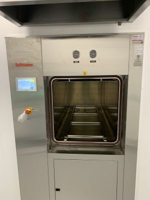 Open chamber and touchscreen on Tuttnauer 66E autoclave installed at Optimi Health