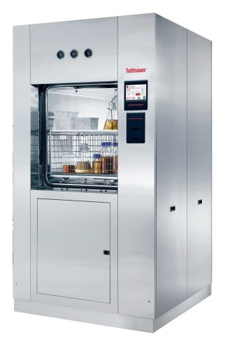 Tuttnauer 66C 430 L horizontal laboratory autoclave with open door and loaded rack